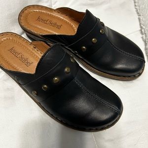 Josef Seibel brand black slip-on shoes. Black